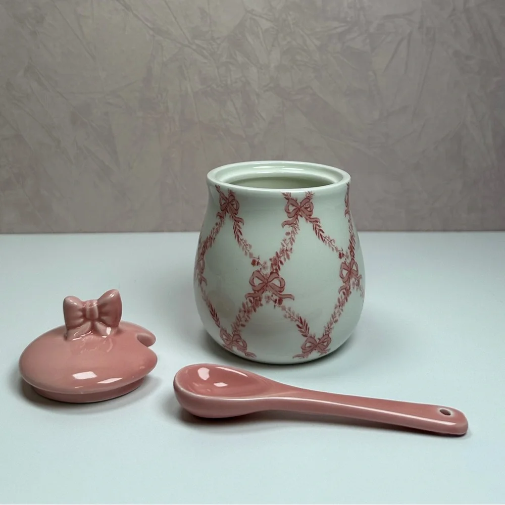 Elegant Pink and White Ceramic Sugar Bowl with Bow Accents